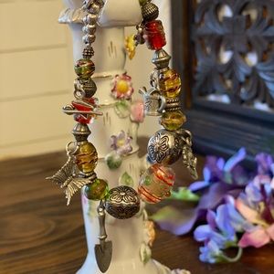 Handmade gardening-themed charm bracelet